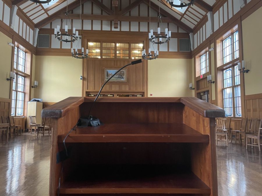 Allen Hall Podium being prepared for Friday morning speeches