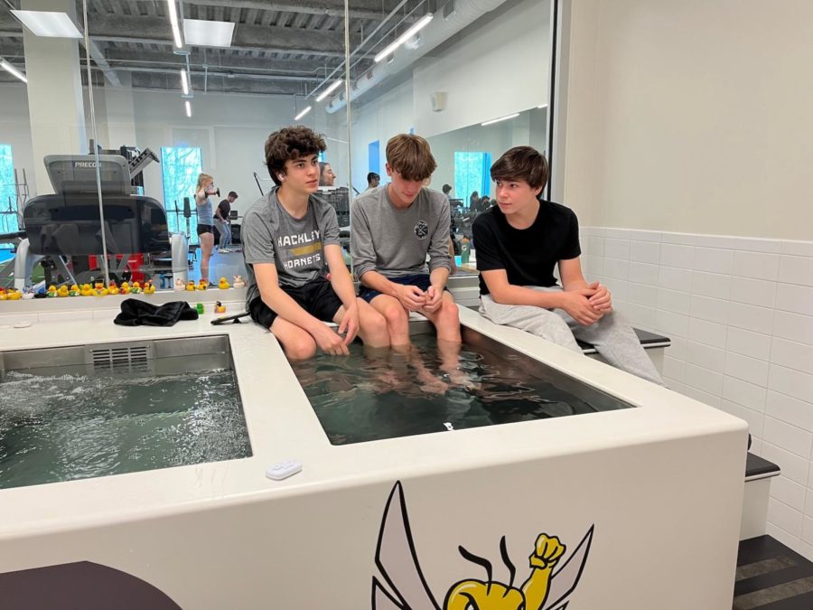 Freshman Jackson B. and Luke K-H are treating their shin splints by applying heat in the hot tub. They are accompanied by freshman Will B. who enjoys frequent visits to his friends in the trainers. Photo by Giulia Sorvillo ‘25. 