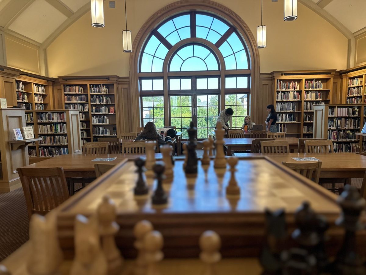 Hackley students working in the library. Many students often play chess and leave in a rush, leaving behind their half finished game. Students come to the library to work and if they need to checkout a book.