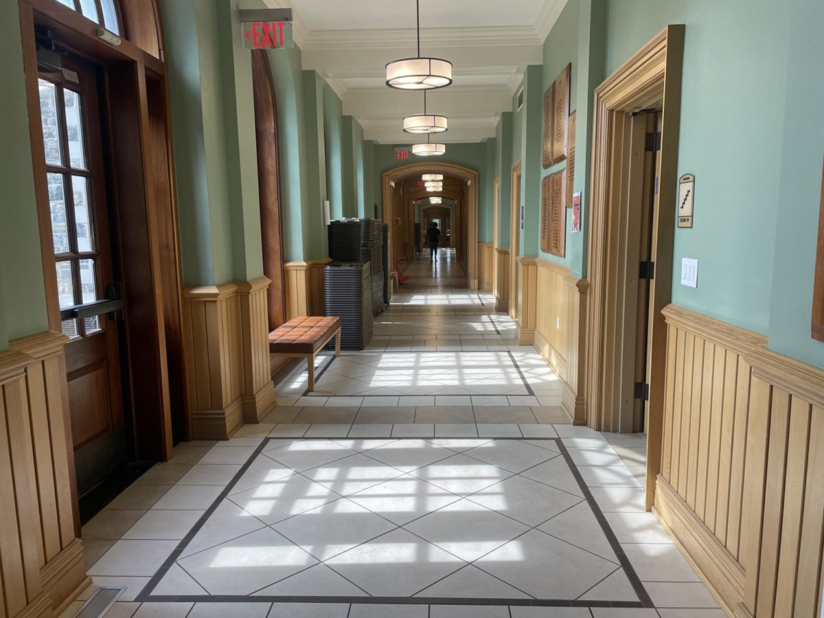The halls of Goodhue during the morning lays silent. In between classes the hallway is booming with students rushing to their classes or making their way to the library upstairs. 