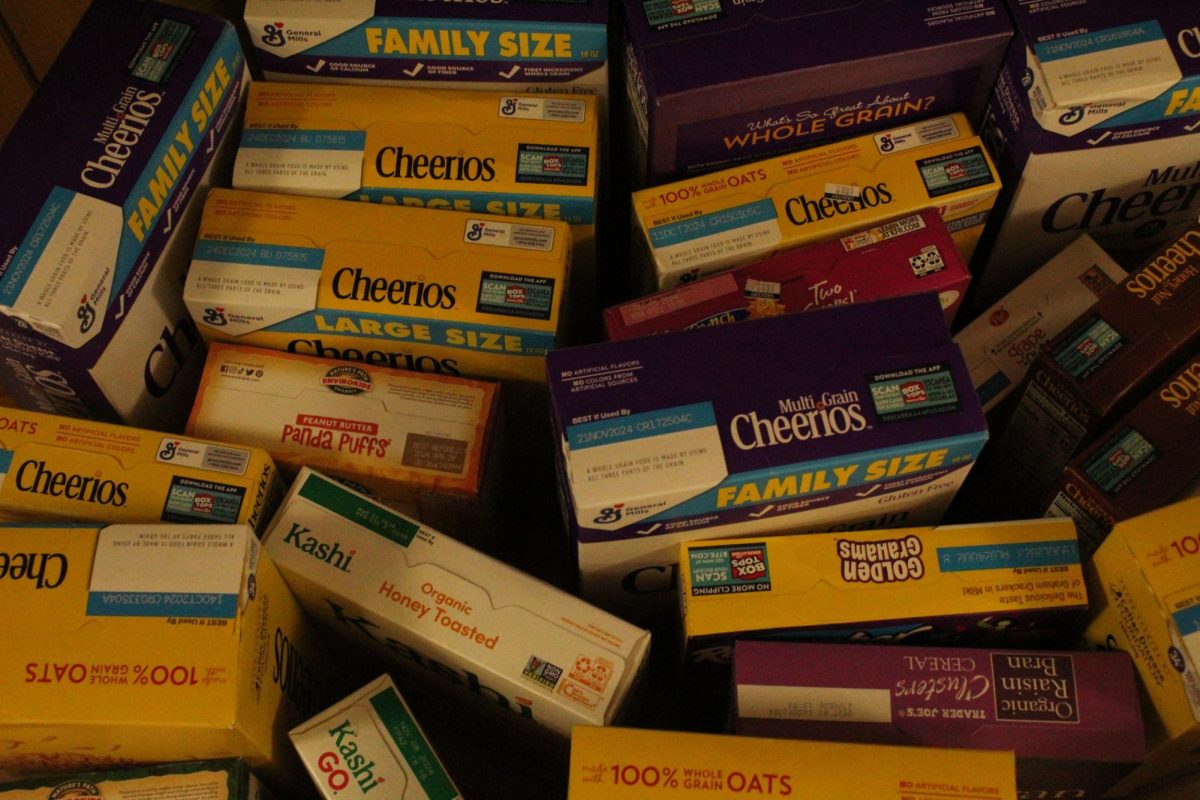 Students collected Cheerios for the upper school food drive.