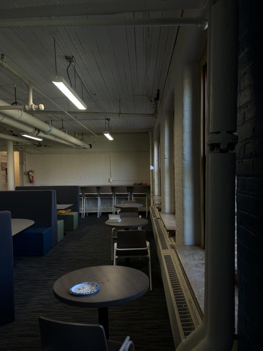 The Student Lounge is dark, barren, and gloomy, awaiting a student to come and enjoy it. While no students arrive to play Blackjack or Brawl Stars, the Student Lounge sits in loneliness.