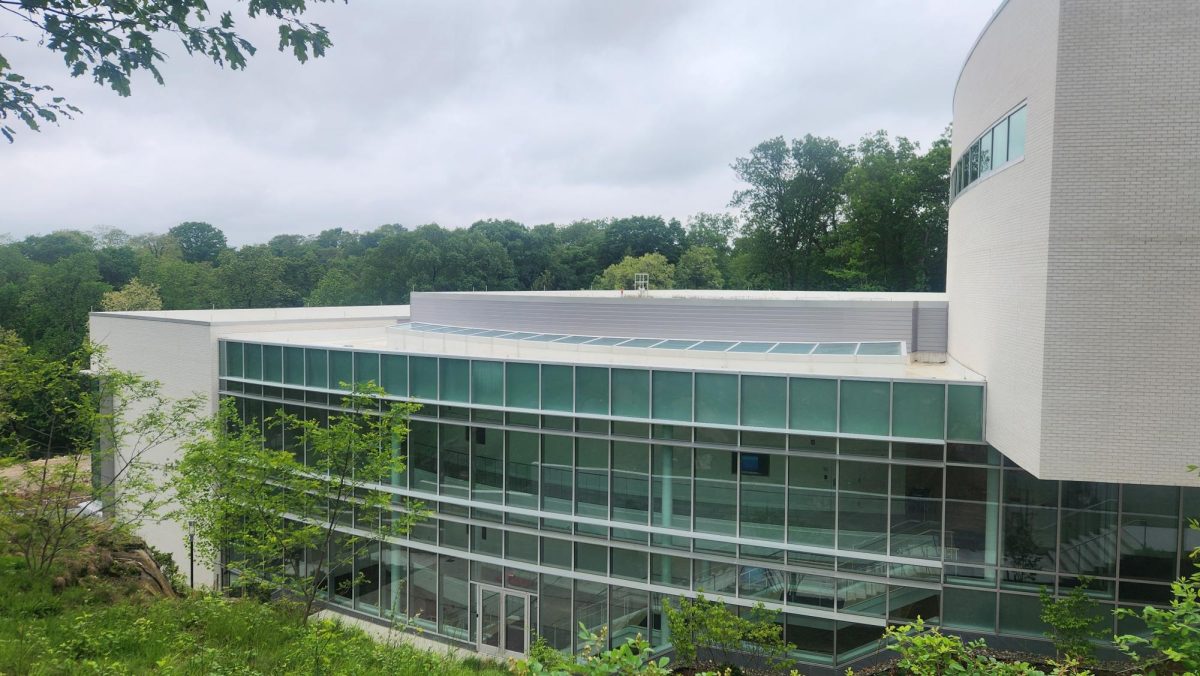 Photo of left side of Creative Arts and Technology Center. Displays the roof of the center and the unique architecture. 