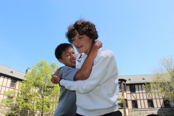 Students of many grades are out and about. Sophomore Nico Kim plays around with sophomore Nate Becker. 
"Wrestle me, Nate! Let's go!" Nico says to Nate.
