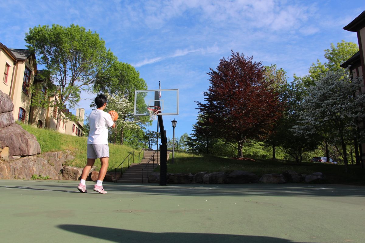 Freshman Marcus Song shoots his shot on the basketball court. He says "I swear i'm gonna make this one", after 10 consecutive misses. The basketball court is one of many fun pastimes that are enjoyed by students on our campus.