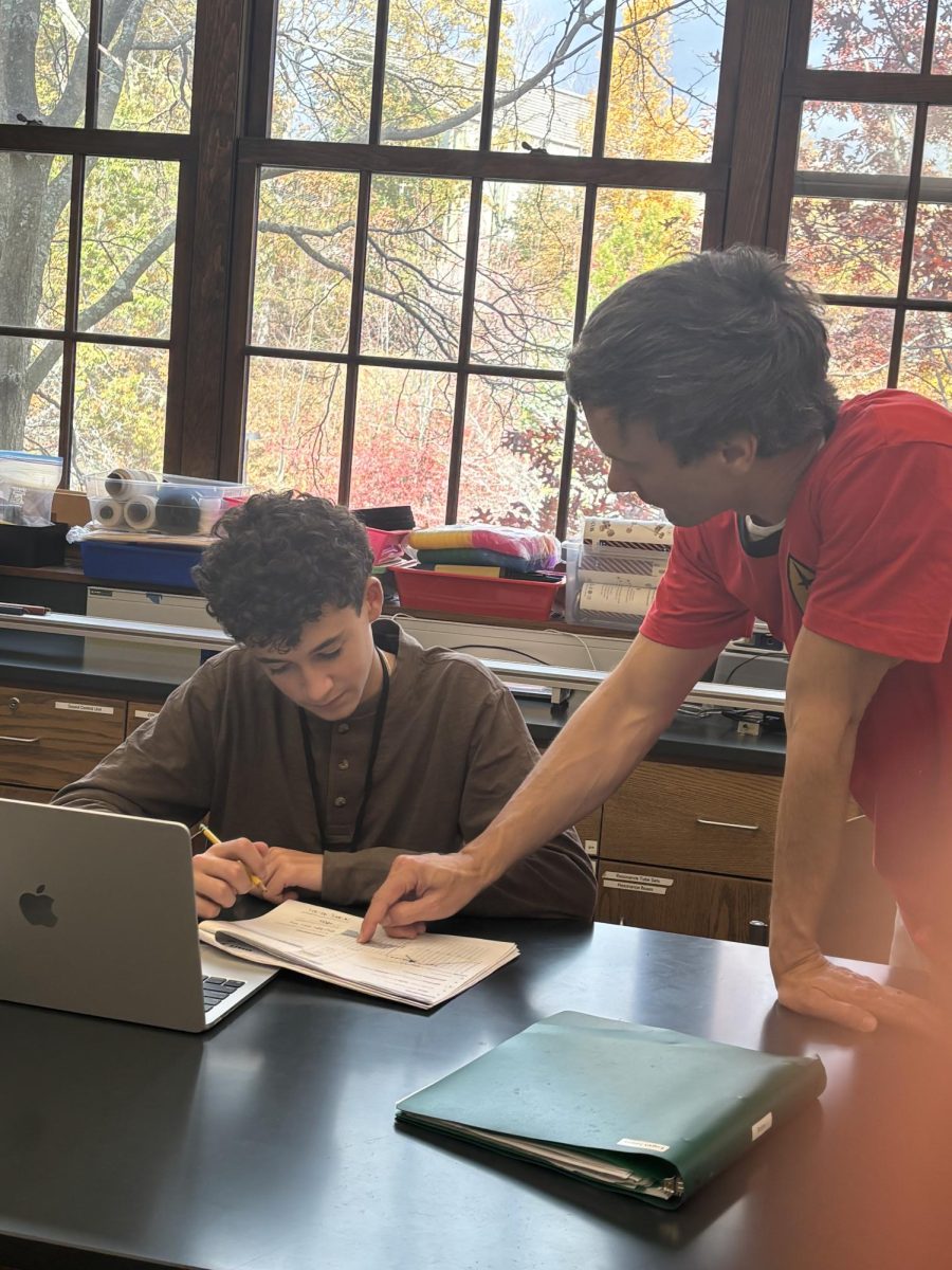 Mr Karpinski helping kind innocent physics student learn physics