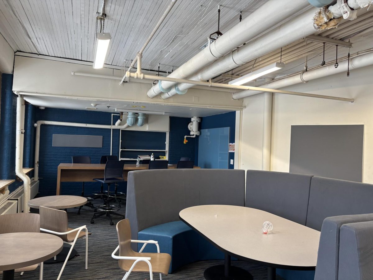 This is the Freshman Lounge, and as you can see, it is piped, it has trash on the table, and it is very ugly.