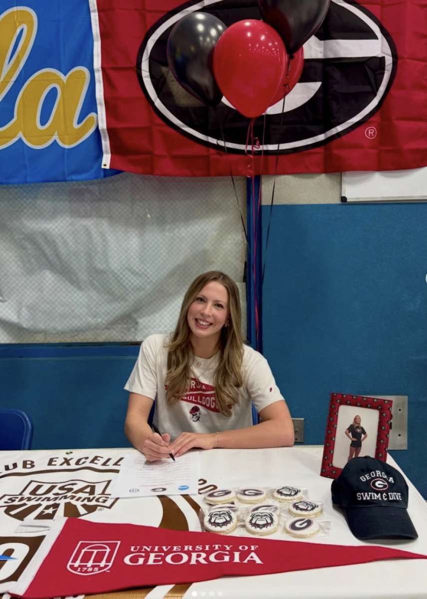 Abby King is here signing her commitment to the University of Georgia

- Photographer: Jon Hulbert