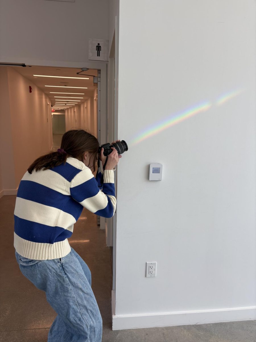 A freshman photographer noticed an interesting subject and immediately took advantage of the opportunity to take a photo of it for her journalism class. 